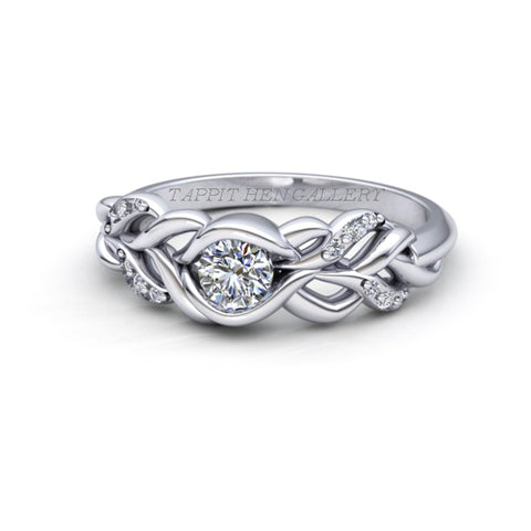 CELTIC PLEAT PAVE RING WITH FLUSH SET DIAMOND IN 9 CT WHITE GOLD