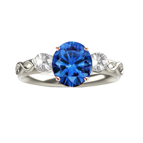 SCOTTISH INFINITY ENGAGEMENT RING WITH SAPPHIRE AND TWO DIAMONDS